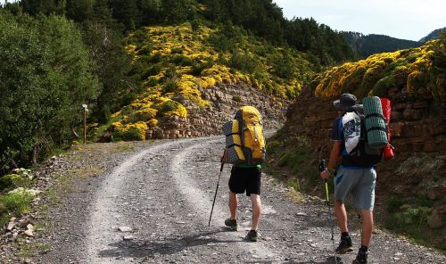 Hikers with heavy backpacks